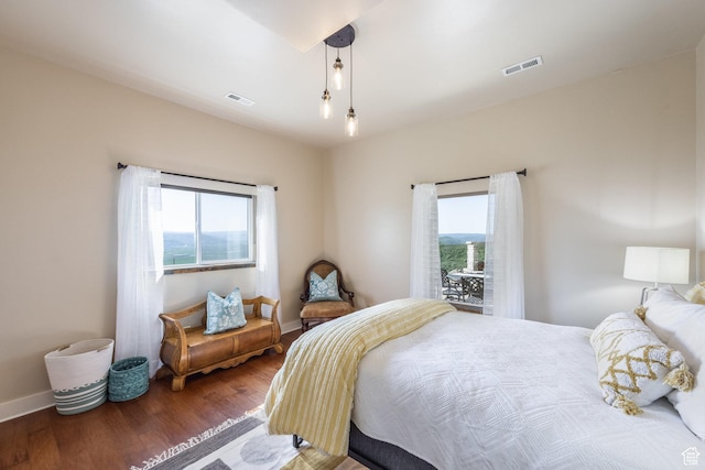 1960 Grandview Loop Unit 41, Kamas, UT 84036 - bedroom with multiple windows, wood finished floors, and baseboards