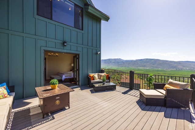 1960 Grandview Loop Unit 41, Kamas, UT 84036 - wooden deck featuring a mountain view and an outdoor hangout area