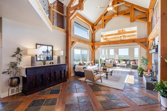 1960 Grandview Loop Unit 41, Kamas, UT 84036 - living room featuring high vaulted ceiling, baseboards, beamed ceiling, and ceiling fan