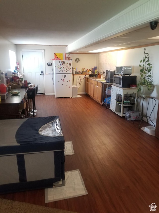 4895 W 5000 S, Hooper, UT 84315 - kitchen featuring freestanding refrigerator, stainless steel microwave, and wood finished floors