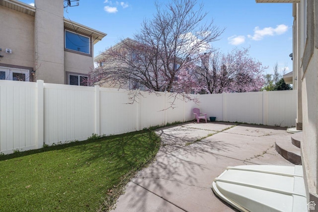 7819 S Spruce Tree Ln, Sandy, UT 84094 - view of yard featuring a patio