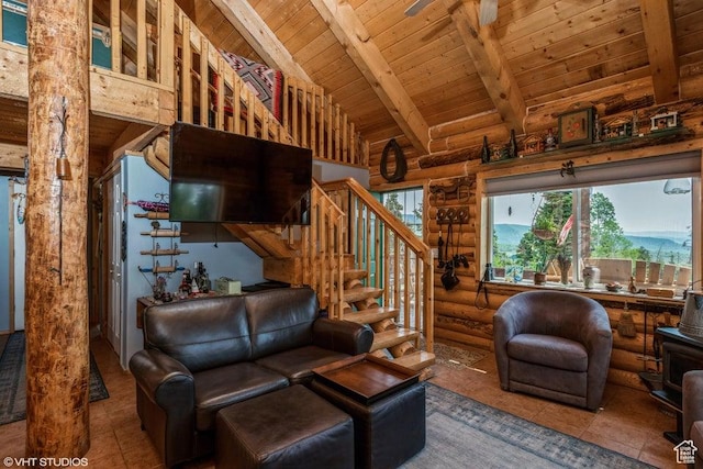 706 W Tranquility Dr, Virgin, UT 84779 - tiled living room featuring wooden ceiling with exposed beams, log walls, stairs, and high vaulted ceiling