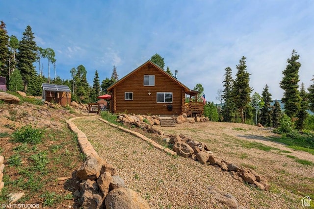 706 W Tranquility Dr, Virgin, UT 84779 - view of home's exterior featuring log exterior, an exterior structure, and an outdoor structure
