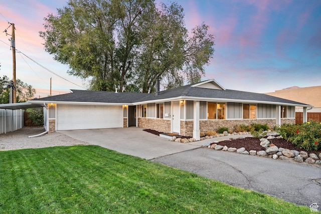 807 E Ln Dore Dr, Salt Lake City, UT 84107 - ranch-style house featuring stone siding, board and batten siding, an attached garage, driveway, and a lawn