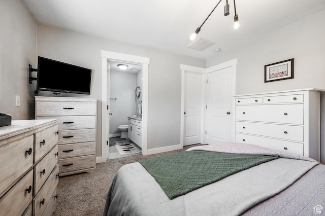 807 E Ln Dore Dr, Salt Lake City, UT 84107 - carpeted bedroom featuring ensuite bathroom and baseboards