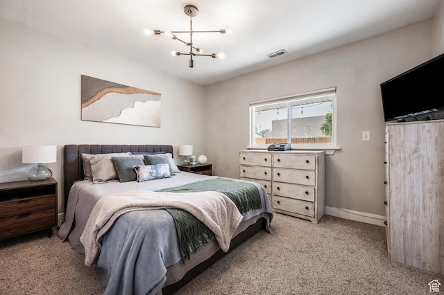 807 E Ln Dore Dr, Salt Lake City, UT 84107 - bedroom with a chandelier, light carpet, and baseboards