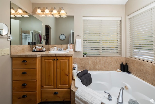1007 E 2650 N, North Logan, UT 84341 - full bath featuring vanity and a jetted tub
