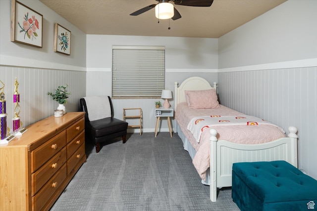 1007 E 2650 N, North Logan, UT 84341 - carpeted bedroom with a wainscoted wall and ceiling fan