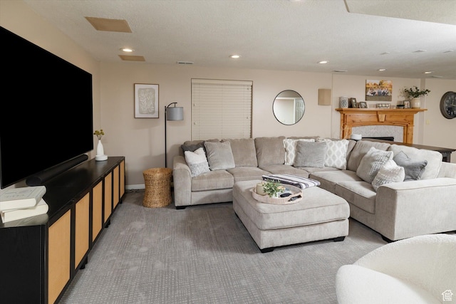 1007 E 2650 N, North Logan, UT 84341 - carpeted living room featuring a fireplace and recessed lighting