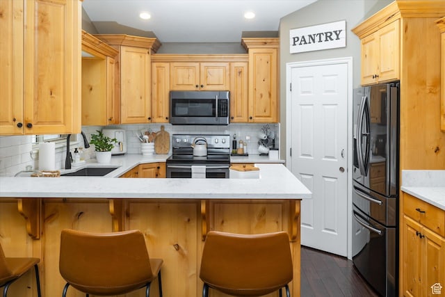 1007 E 2650 N, North Logan, UT 84341 - kitchen with stainless steel microwave, fridge with ice dispenser, range with electric stovetop, a sink, and a peninsula