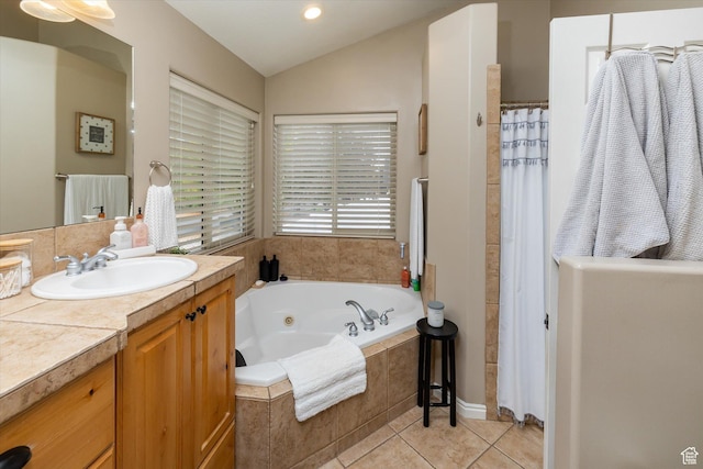 1007 E 2650 N, North Logan, UT 84341 - full bathroom featuring vanity, lofted ceiling, a whirlpool tub, tile patterned floors, and curtained shower
