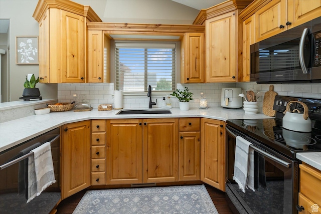 1007 E 2650 N, North Logan, UT 84341 - kitchen featuring black range with electric stovetop, a sink, light countertops, and decorative backsplash
