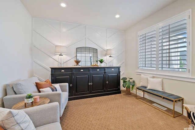 1676 W Timp Meadows Dr, Lehi, UT 84043 - living area with light carpet, recessed lighting, a decorative wall, and baseboards