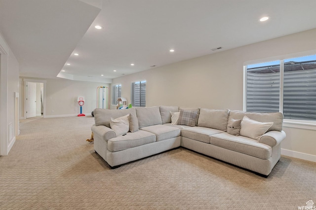 1676 W Timp Meadows Dr, Lehi, UT 84043 - living area with recessed lighting, baseboards, light carpet, and plenty of natural light