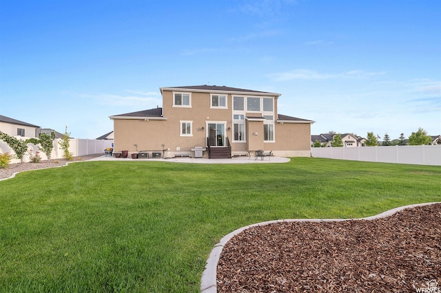 1676 W Timp Meadows Dr, Lehi, UT 84043 - back of house with a patio area, entry steps, and stucco siding