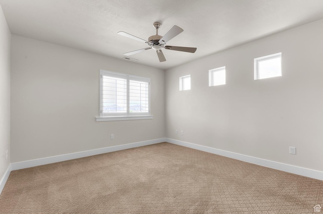 1676 W Timp Meadows Dr, Lehi, UT 84043 - carpeted spare room with baseboards and ceiling fan