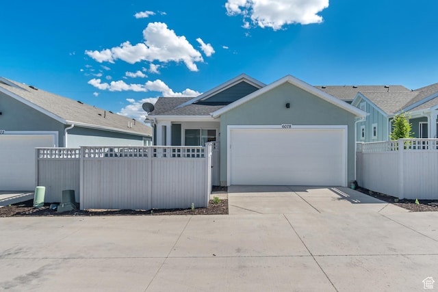 6078 W 11800 S Unit 490, South Jordan, UT 84009 - ranch-style house with an attached garage, concrete driveway, and stucco siding