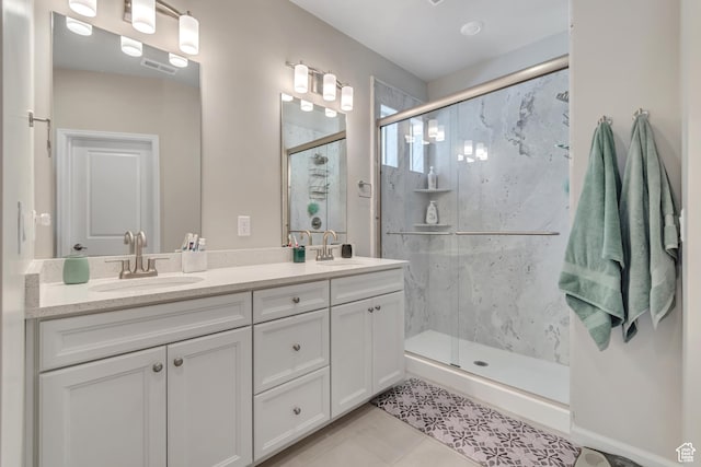 6078 W 11800 S Unit 490, South Jordan, UT 84009 - full bath featuring a marble finish shower, double vanity, and tile patterned flooring