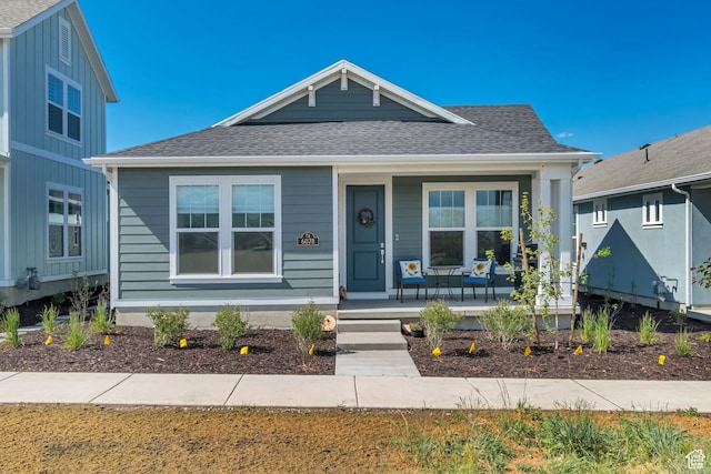 6078 W 11800 S Unit 490, South Jordan, UT 84009 - bungalow-style home featuring covered porch and roof with shingles