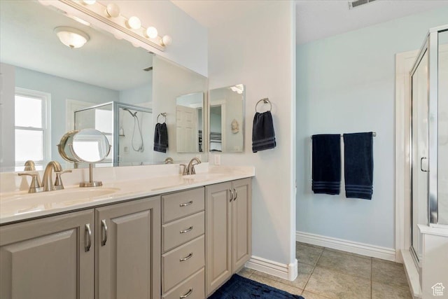 286 W 1875 N, North Ogden, UT 84414 - bathroom with a shower stall, double vanity, tile patterned flooring, and baseboards