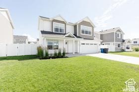 1186 W 200 S, Logan, UT 84321 - view of front facade featuring an attached garage and driveway