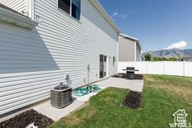 1186 W 200 S, Logan, UT 84321 - view of side of home with a patio area and cooling unit