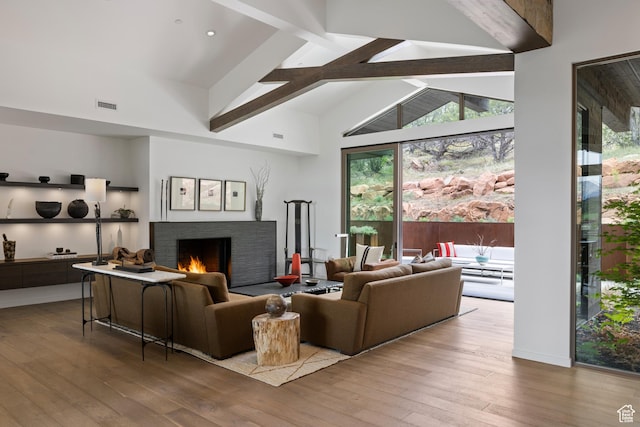 310 Red Ledges Blvd, Heber City, UT 84032 - living room featuring a fireplace, hardwood / wood-style floors, beam ceiling, and high vaulted ceiling