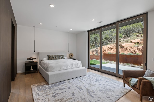 310 Red Ledges Blvd, Heber City, UT 84032 - bedroom featuring access to outside, light wood-style floors, and recessed lighting