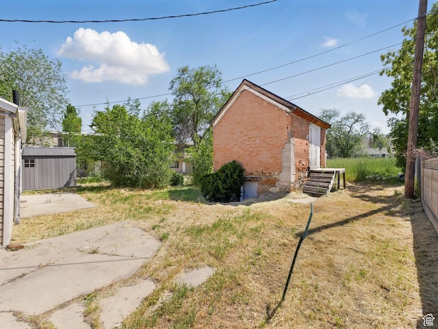 250 N 100 E, Tooele, UT 84074 - view of yard with a patio