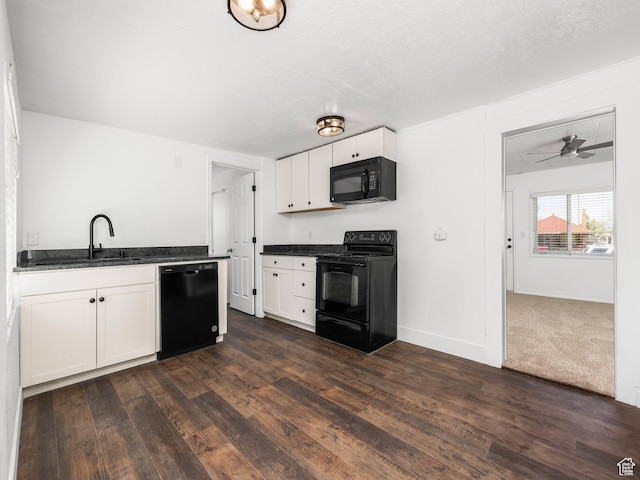 250 N 100 E, Tooele, UT 84074 - kitchen with black appliances, a sink, white cabinets, and dark wood-style flooring