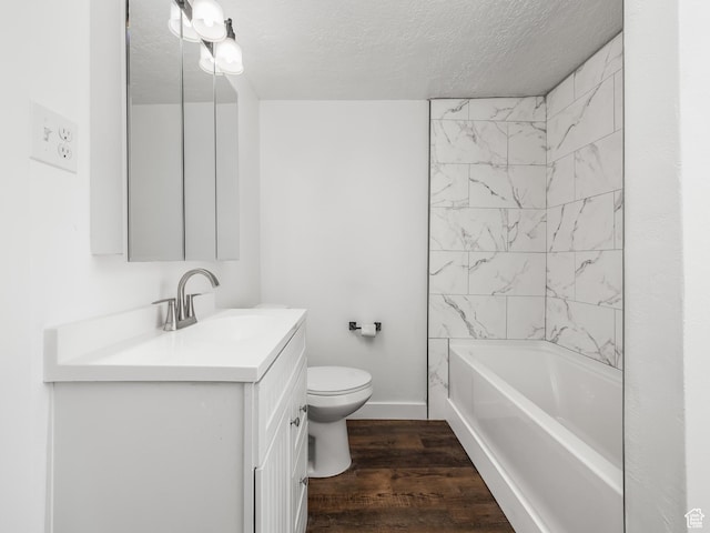 250 N 100 E, Tooele, UT 84074 - full bathroom featuring vanity, toilet, a textured ceiling, wood finished floors, and baseboards