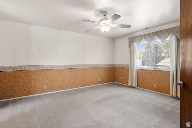 1922 E Southbridge Way, Sandy, UT 84093 - unfurnished room featuring carpet flooring, a ceiling fan, and wainscoting