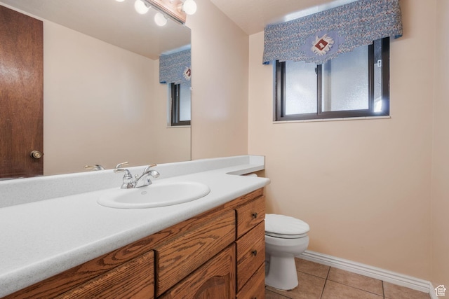 1922 E Southbridge Way, Sandy, UT 84093 - bathroom featuring toilet, vanity, tile patterned floors, and baseboards