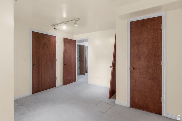 1922 E Southbridge Way, Sandy, UT 84093 - unfurnished bedroom featuring carpet flooring, track lighting, and baseboards