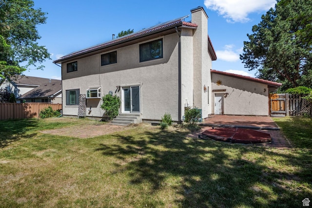 1922 E Southbridge Way, Sandy, UT 84093 - back of house with entry steps, stucco siding, and a chimney