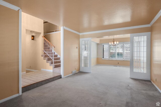 1922 E Southbridge Way, Sandy, UT 84093 - unfurnished room featuring a chandelier, carpet flooring, crown molding, stairs, and baseboards
