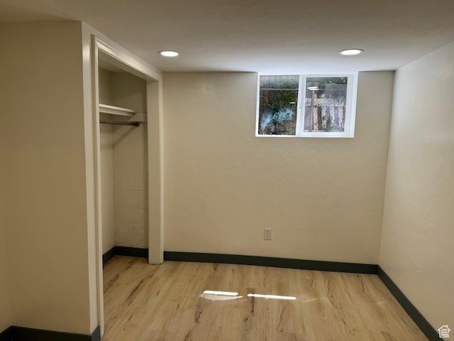 559 E Harmston Ave, Roosevelt, UT 84066 - unfurnished bedroom featuring light wood-style floors, baseboards, a closet, and recessed lighting