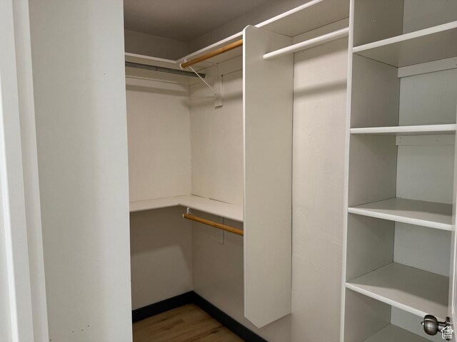 559 E Harmston Ave, Roosevelt, UT 84066 - walk in closet featuring wood finished floors
