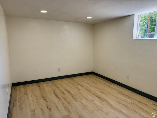 559 E Harmston Ave, Roosevelt, UT 84066 - unfurnished room featuring wood finished floors, recessed lighting, and baseboards