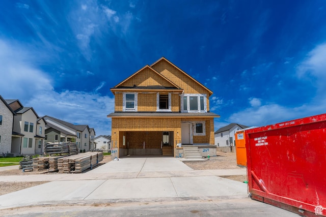 993 N 3620 W Unit 264, Saratoga Springs, UT 84043 - view of front of house featuring concrete driveway, a residential view, and a porch