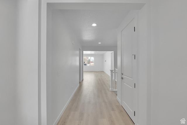 1147 N 375 W Unit 11, Harrisville, UT 84404 - corridor with light wood-type flooring, recessed lighting, and baseboards