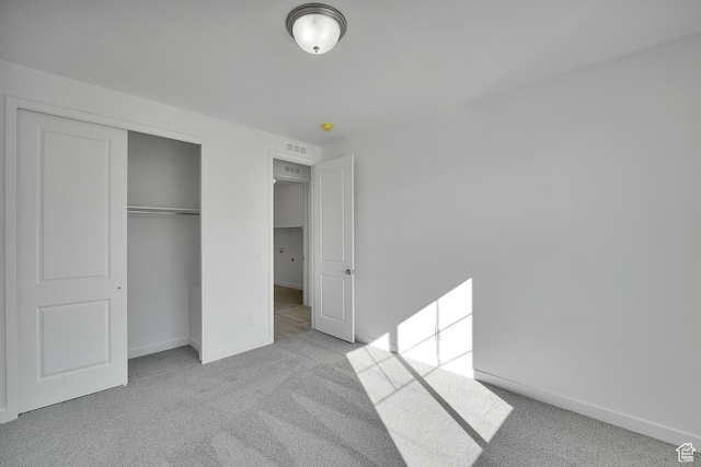 1147 N 375 W Unit 11, Harrisville, UT 84404 - unfurnished bedroom featuring carpet floors, baseboards, and a closet
