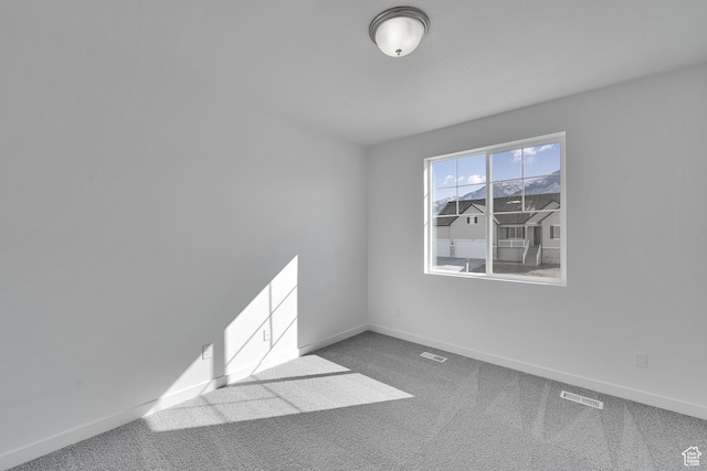 1147 N 375 W Unit 11, Harrisville, UT 84404 - carpeted spare room with baseboards