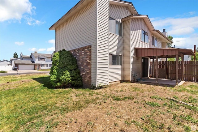190 W 1100 N, Logan, UT 84341 - view of side of property featuring brick siding and a chimney