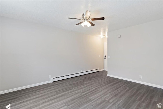 190 W 1100 N, Logan, UT 84341 - unfurnished room with a baseboard radiator, ceiling fan, wood finished floors, and baseboards