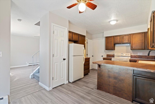 190 W 1100 N, Logan, UT 84341 - kitchen with white appliances, a sink, a baseboard radiator, light wood finished floors, and ceiling fan