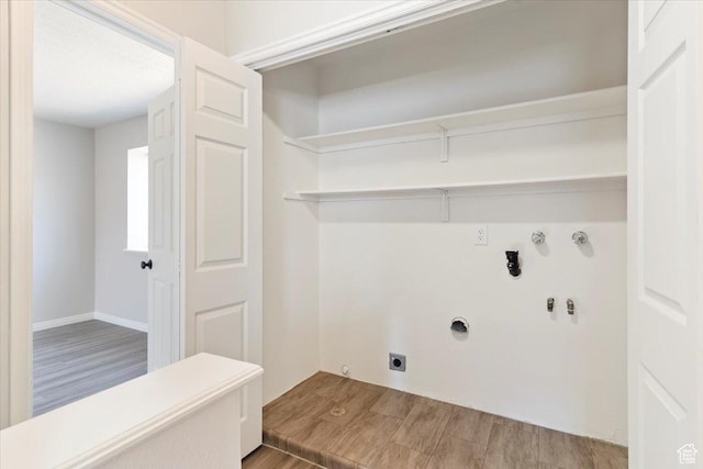 190 W 1100 N, Logan, UT 84341 - washroom featuring hookup for an electric dryer, hookup for a gas dryer, wood finished floors, and hookup for a washing machine