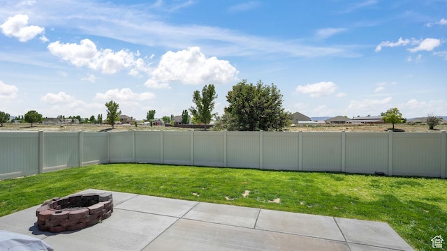 1026 E Searle Ln, Eagle Mountain, UT 84005 - view of yard featuring a fire pit and a patio