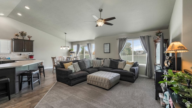 1026 E Searle Ln, Eagle Mountain, UT 84005 - living area with lofted ceiling, ceiling fan, recessed lighting, a textured ceiling, and baseboards