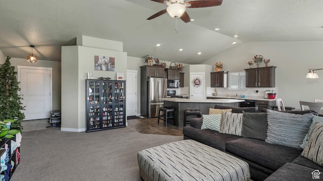 1026 E Searle Ln, Eagle Mountain, UT 84005 - carpeted living room with vaulted ceiling, ceiling fan, and a sink